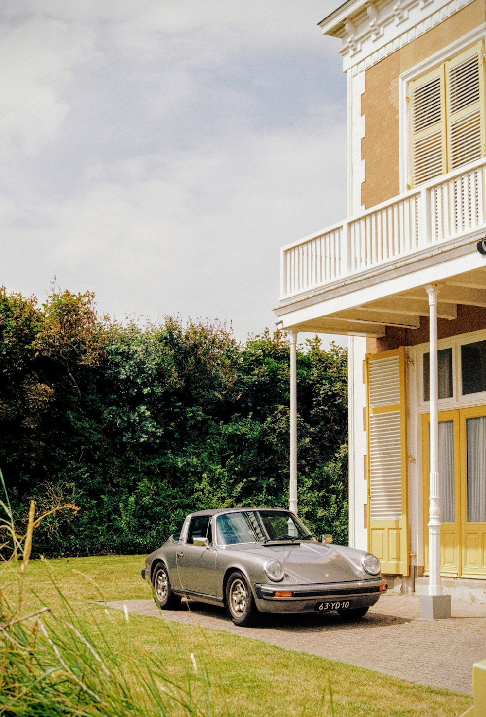 a car parked in front of a house