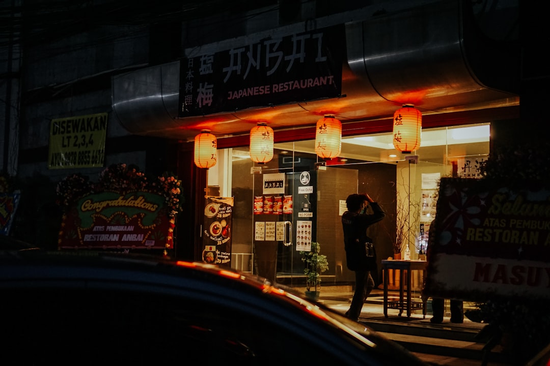 a person walking down a sidewalk, Before We Closed