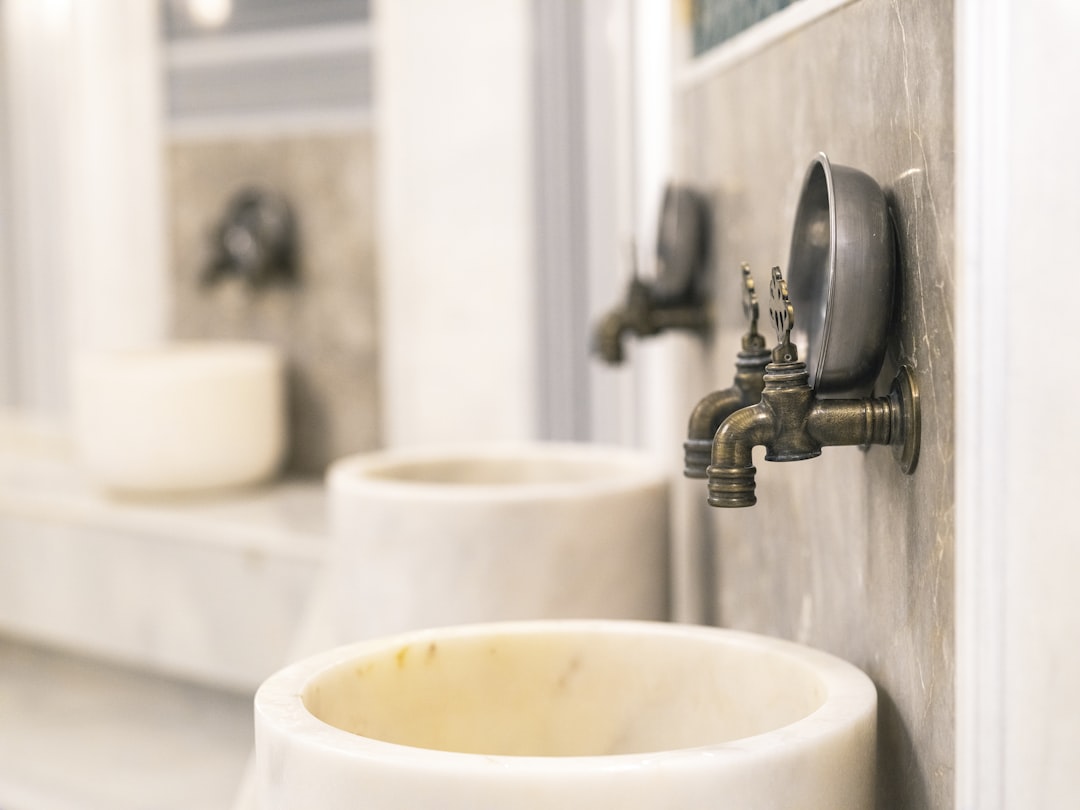 a sink with a faucet, the architecture of a traditional Turkish bath
