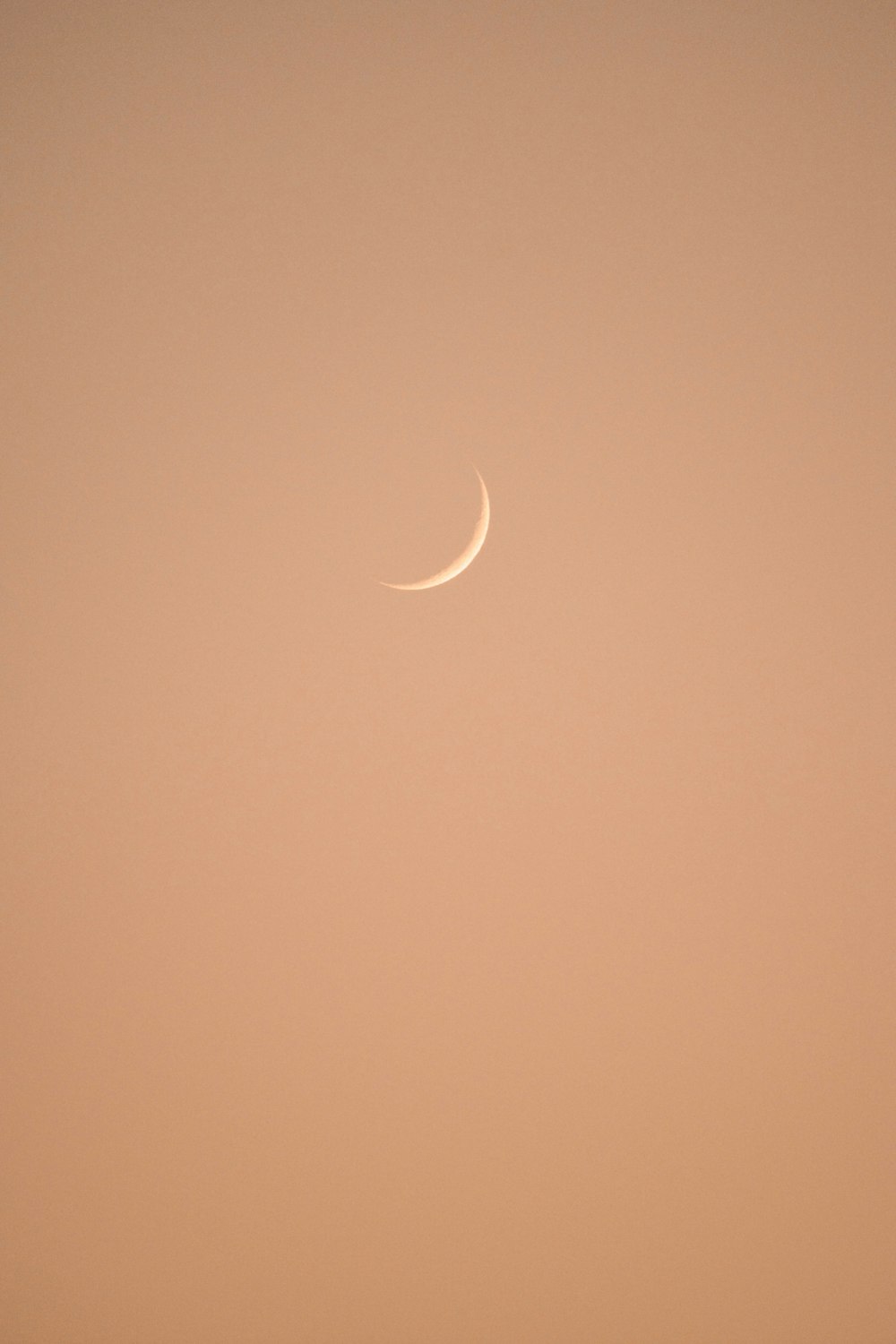 a crescent moon in the sky