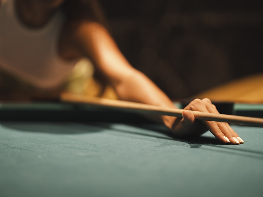 a person playing pool