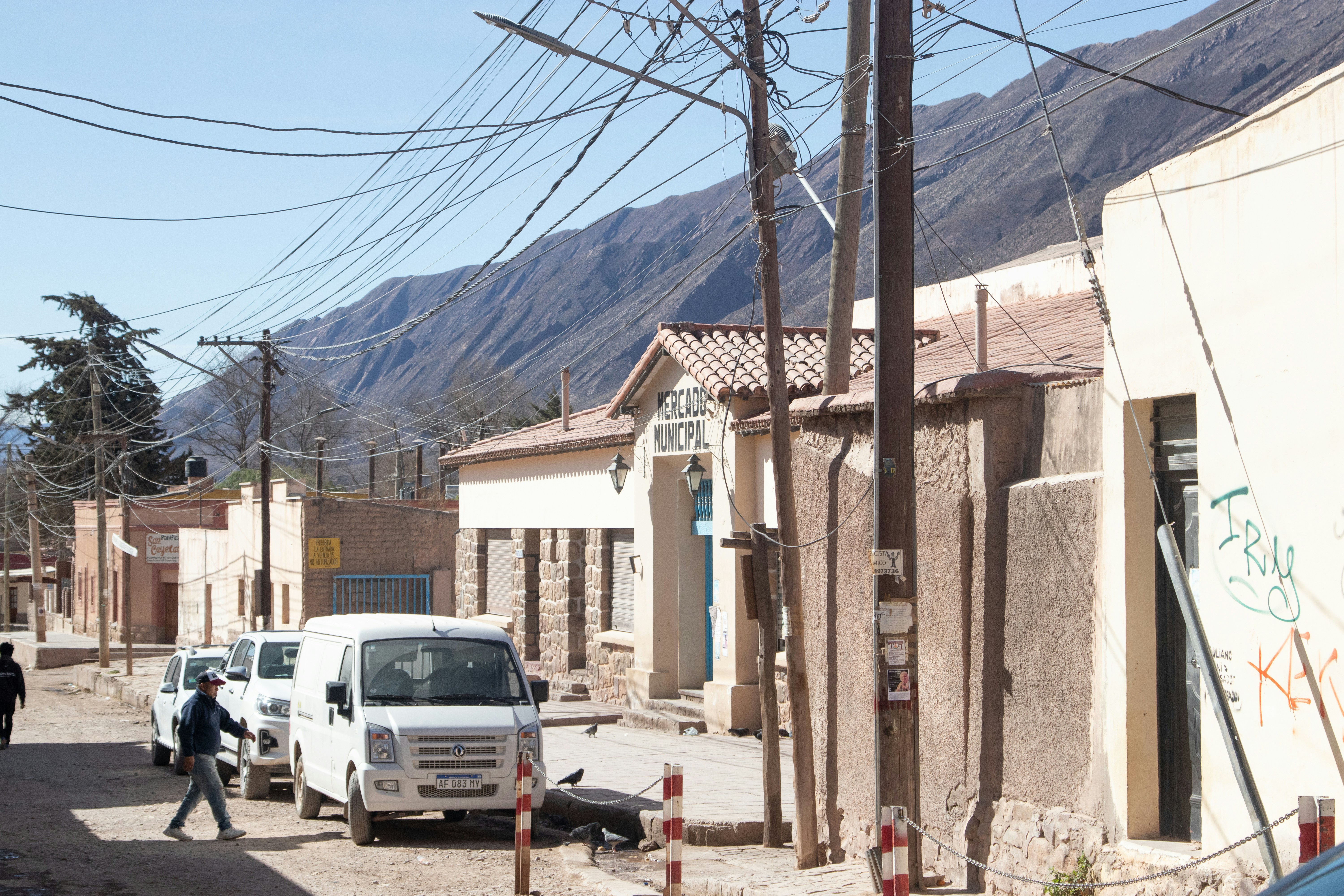 a street with cars and buildings