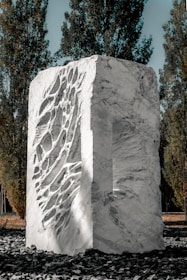 An outdoor exhibition showcasing various stone sculptures.
