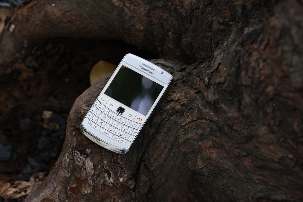 a cell phone on a rock
