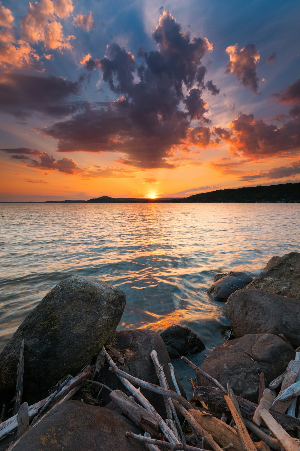 a sunset over a body of water