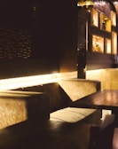 A cozy lounge area with comfortable seating and warm lighting.