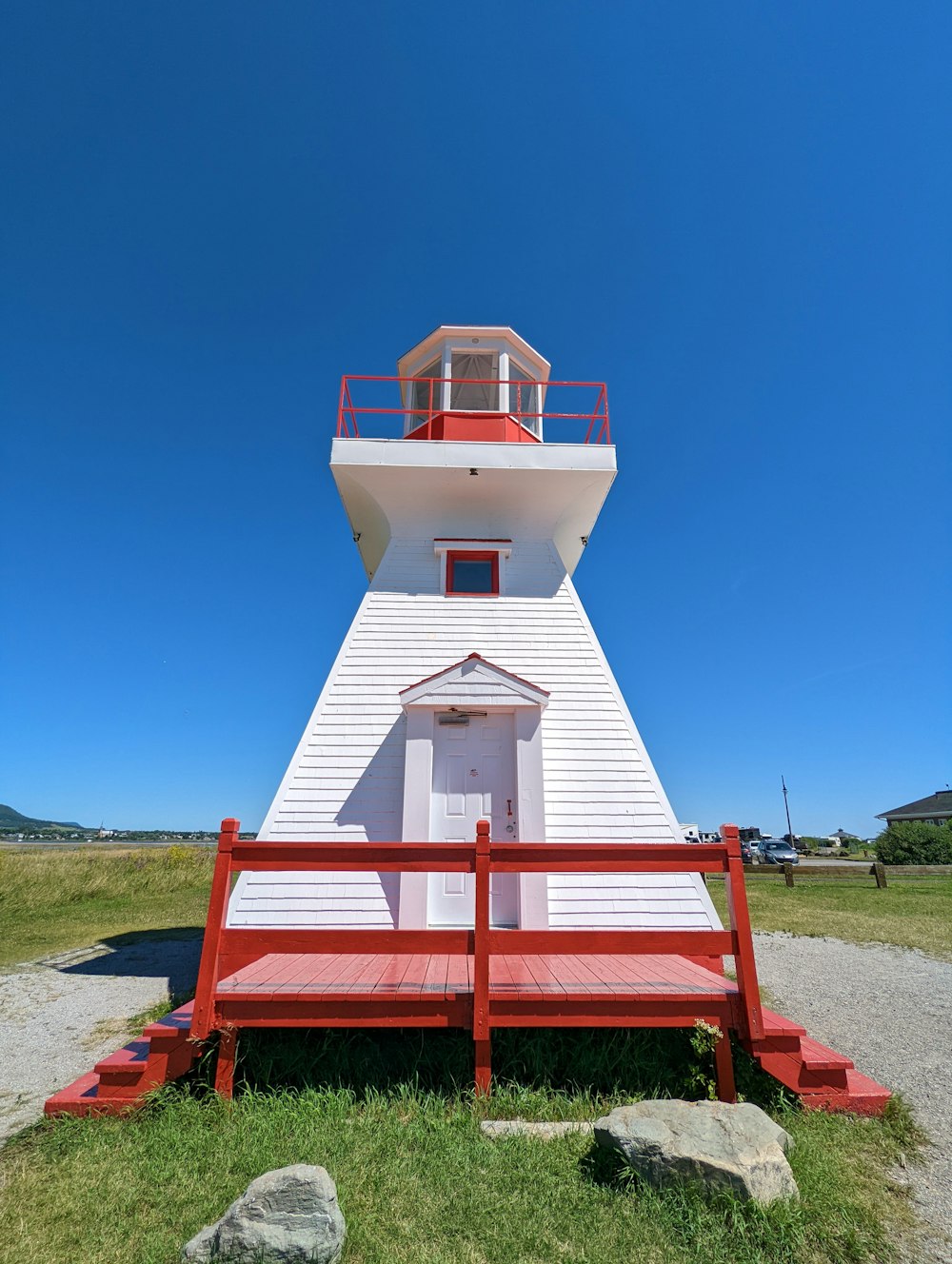 a white and red lighthouse