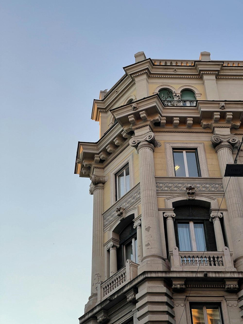 a building with balconies and windows