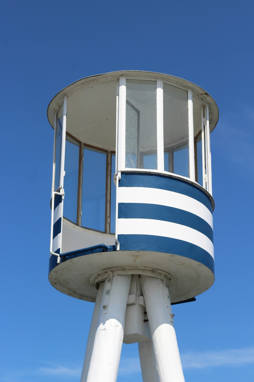 a water tower with a blue sky