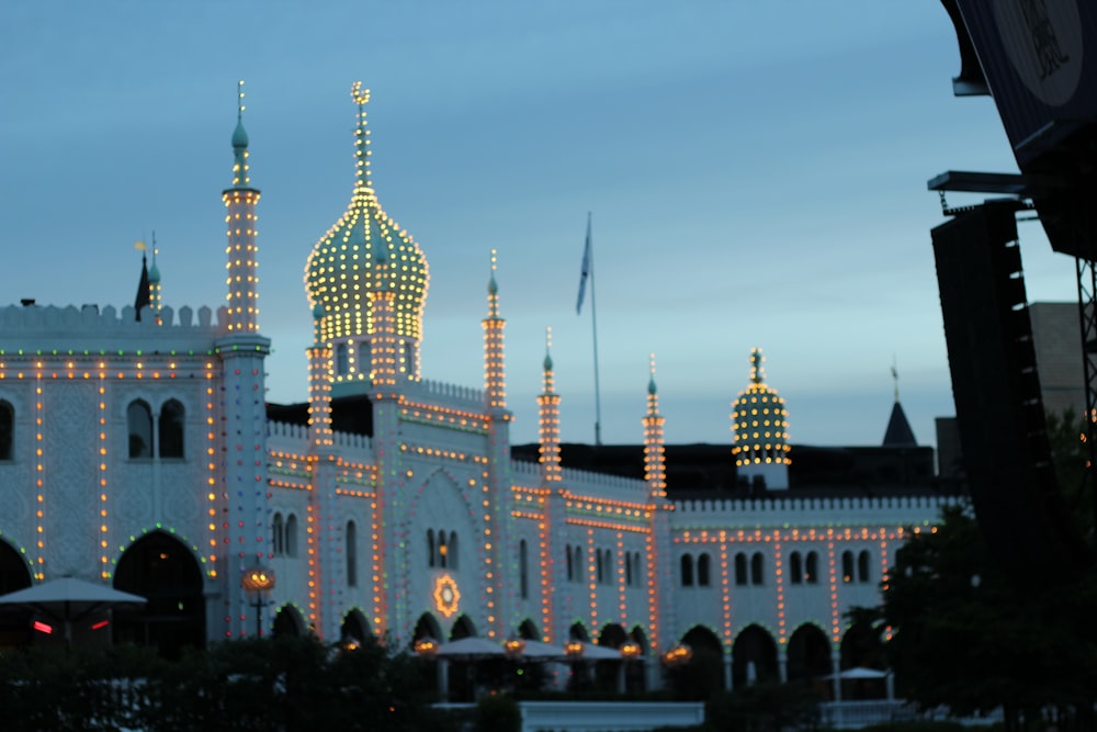 a large white building with towers