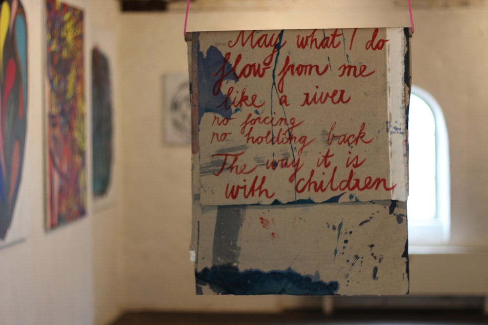 a white board with red writing