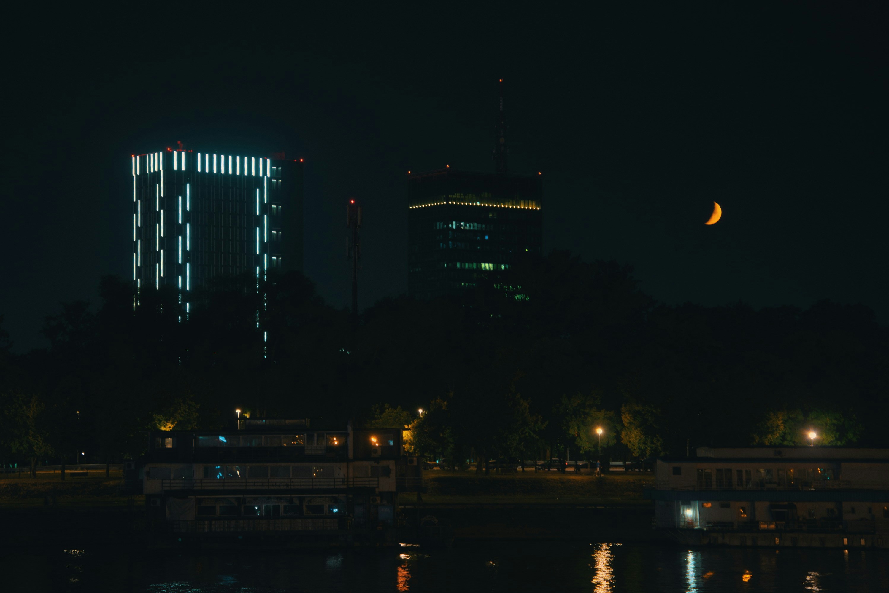 City skyline at night, for a story on Serbia election: student-led opposition wins majority as Vučić concedes