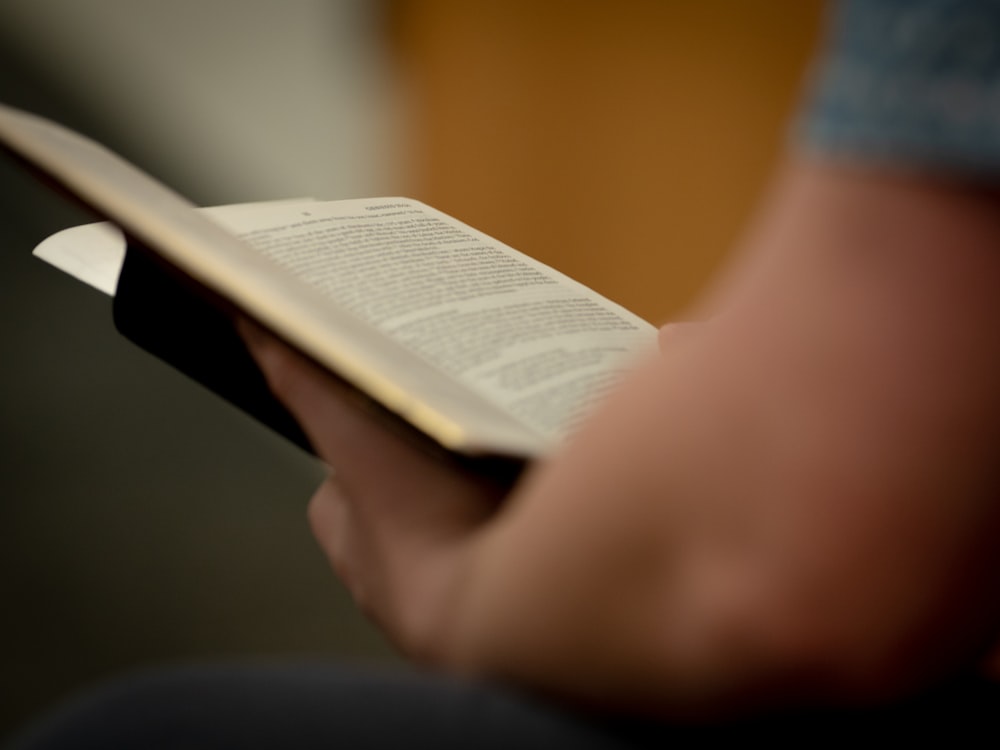 a person holding a piece of paper