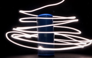 Artistic shot of karataun speakers with sound waves visually represented around them