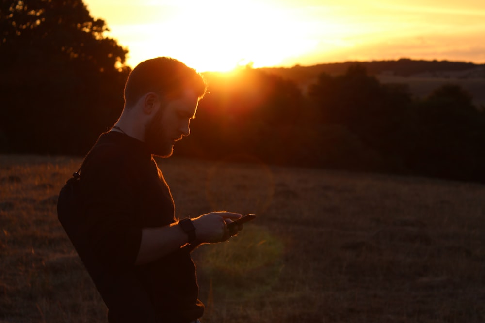 a man holding a phone