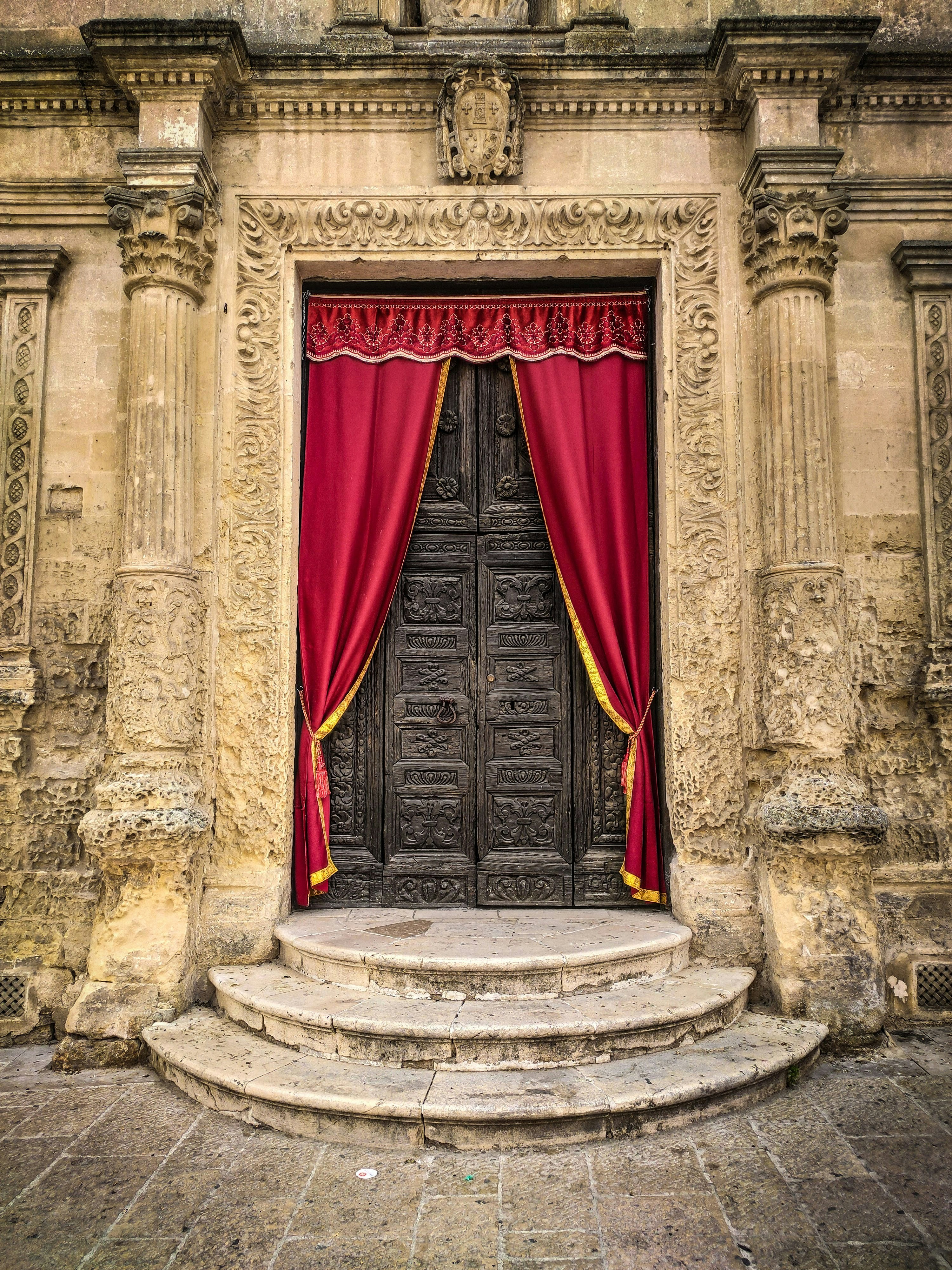 a red curtain from a window