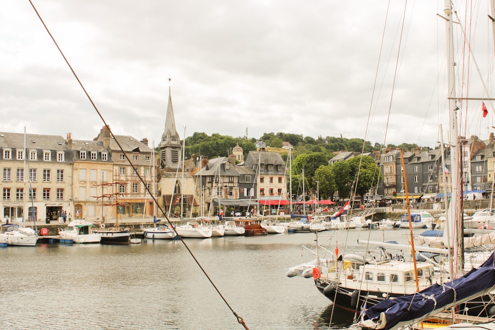 a body of water with boats in it and buildings around it