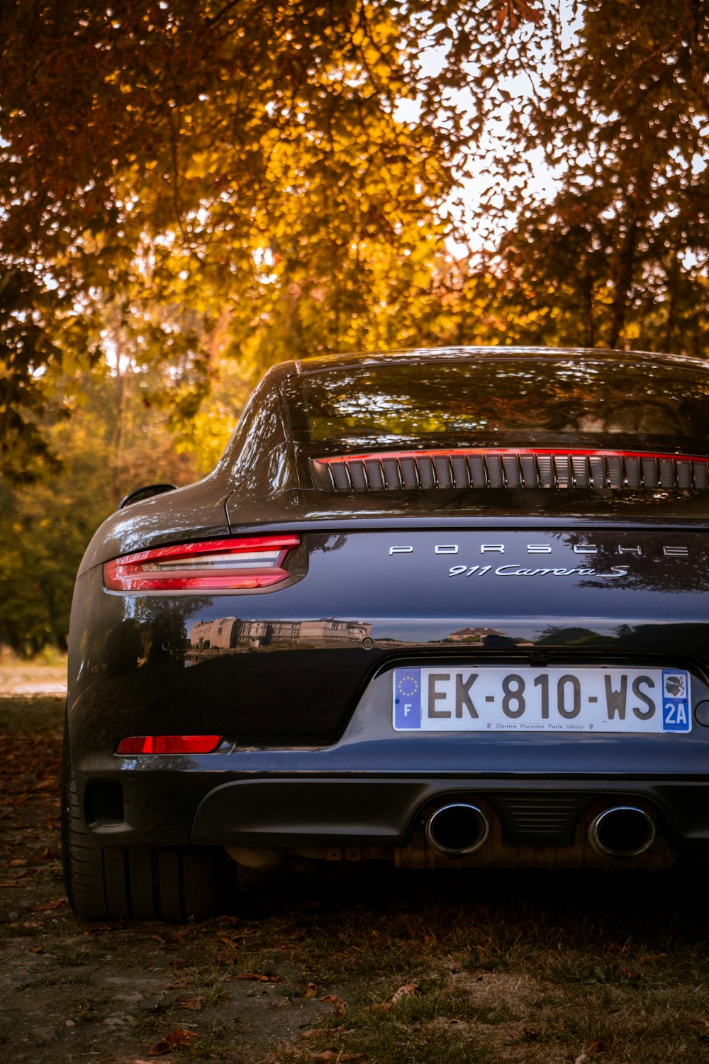 a car parked in a wooded area