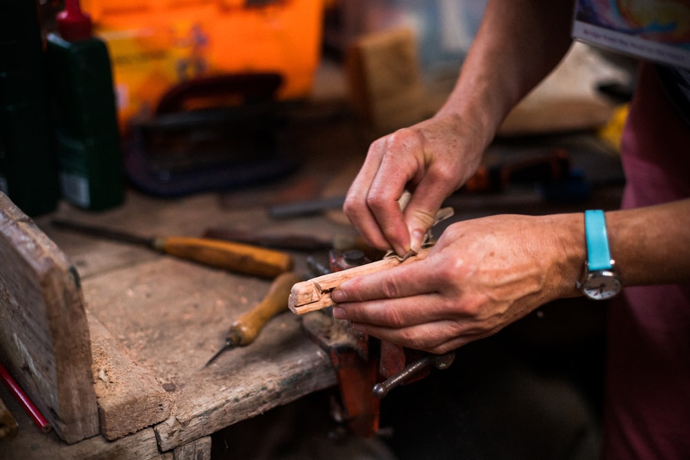 a person holding a tool