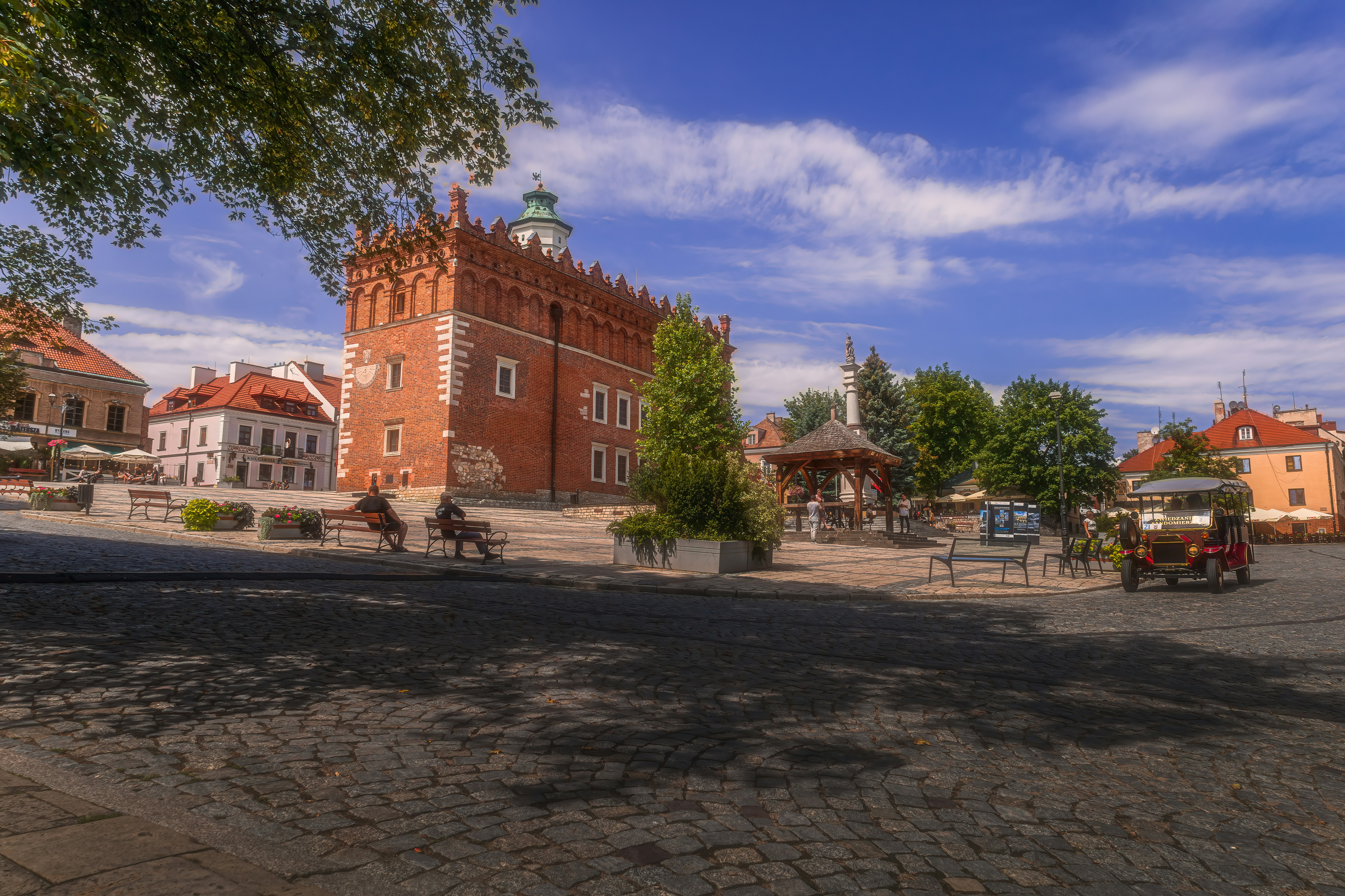 a brick building with a brick walkway