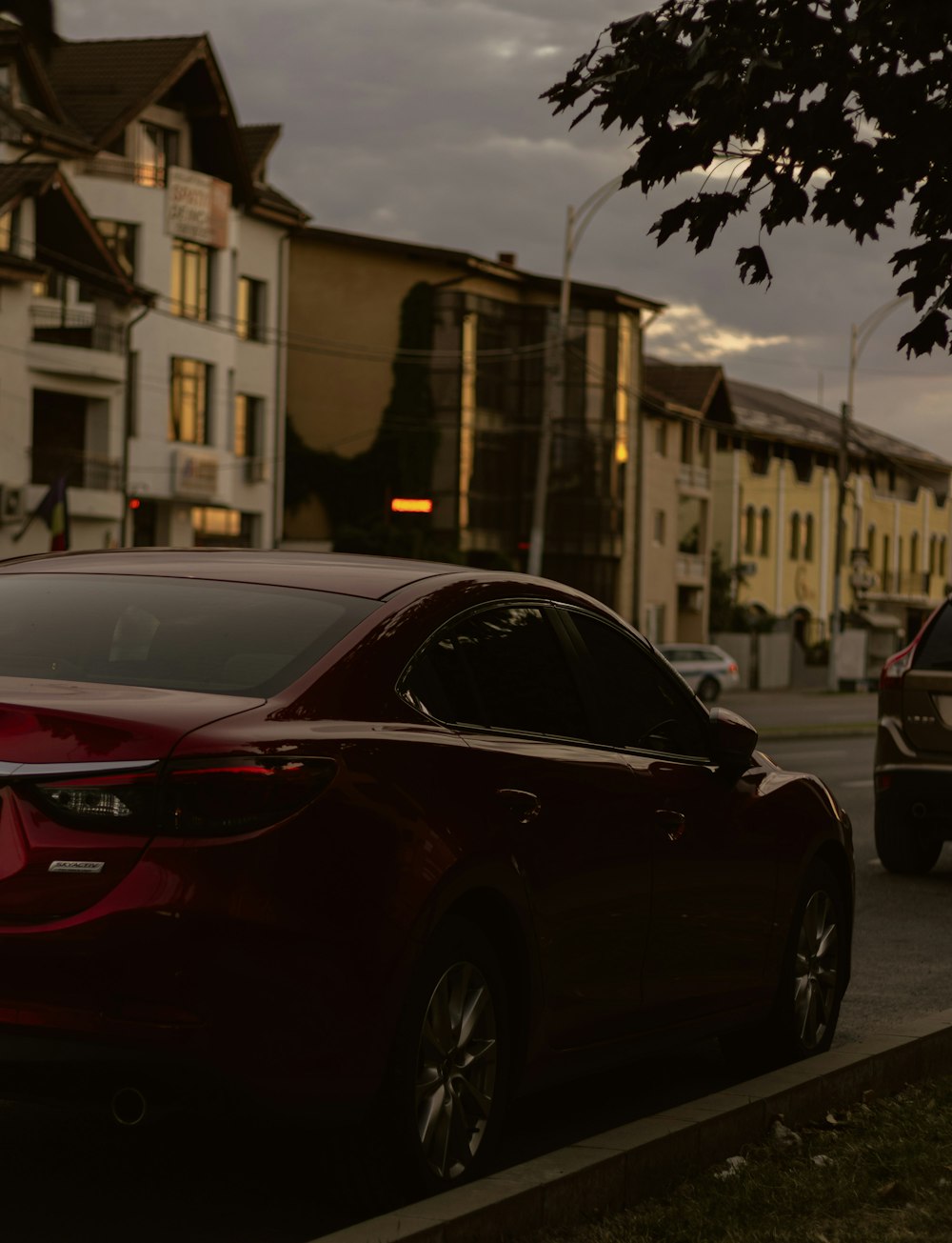 a black car parked on a street