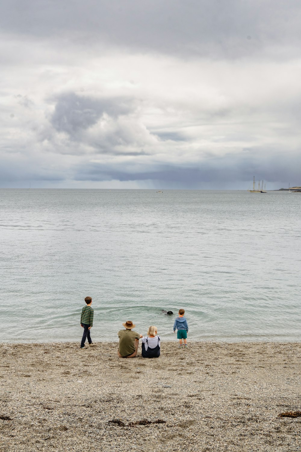 a group of children on a beach