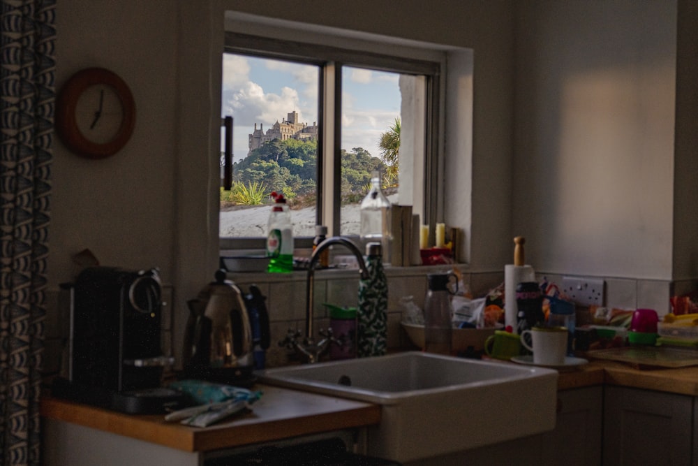 a kitchen with a clock