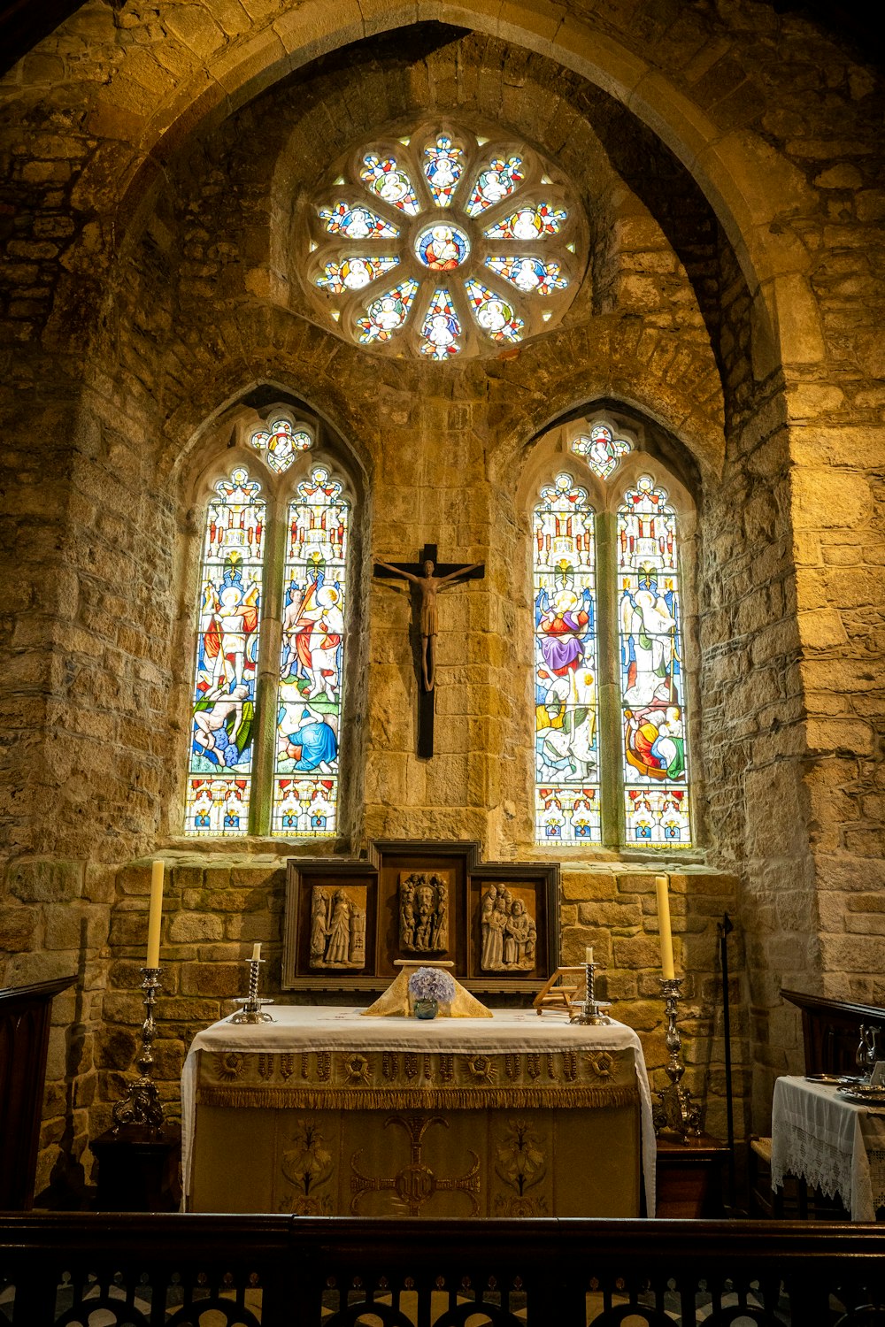 a large stained glass window in a church