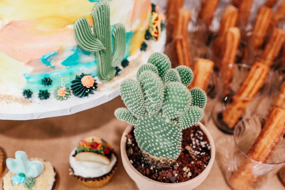 a group of cupcakes with frosting and decorations