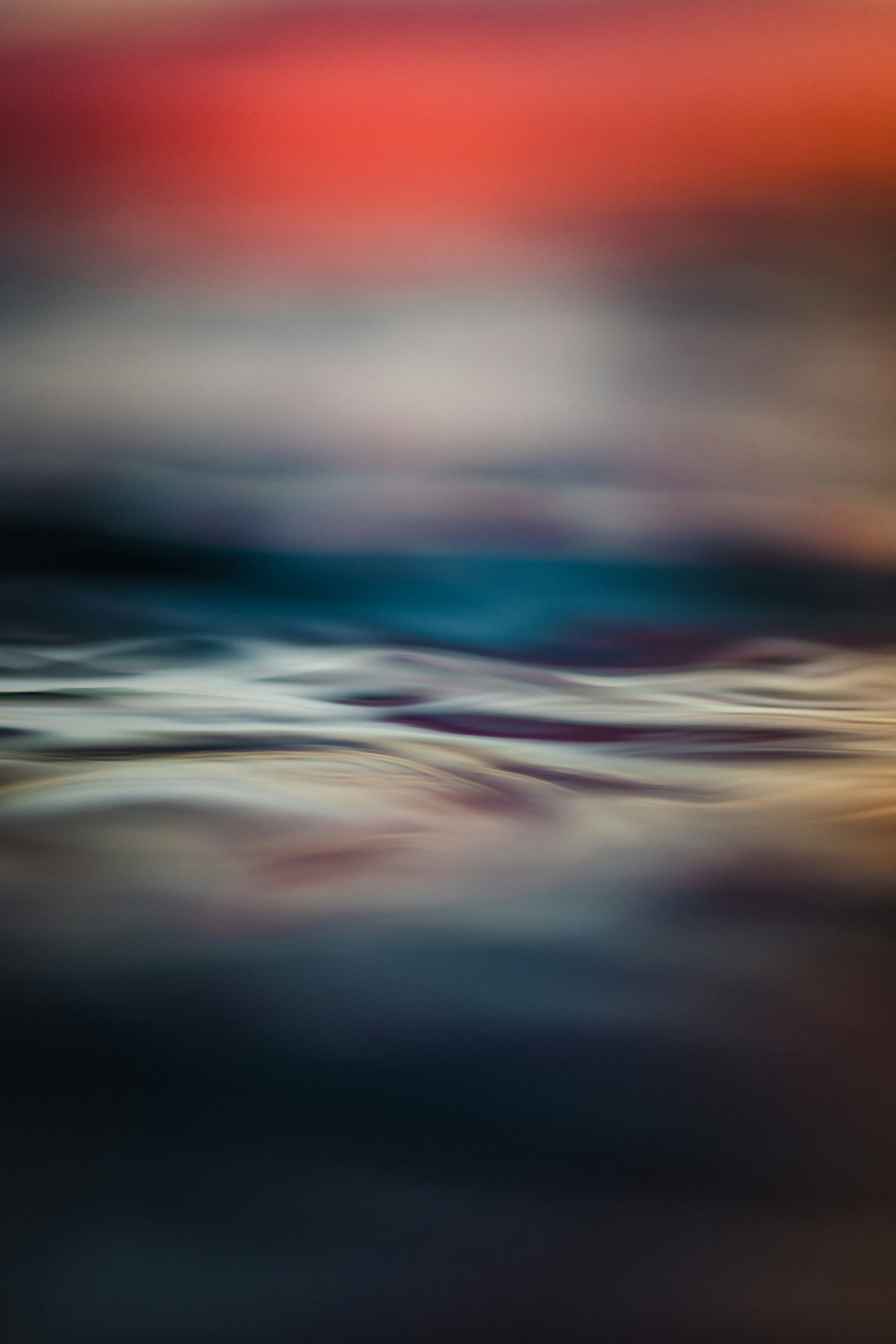 woman wearing yellow long-sleeved dress under white clouds and blue sky during daytime