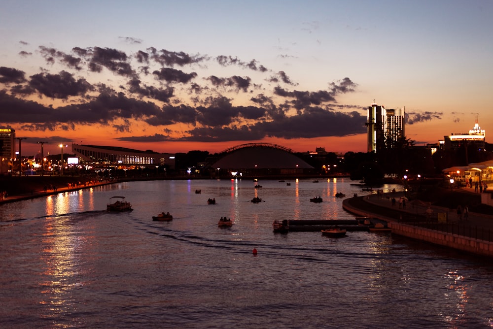 a bridge over a river with boats