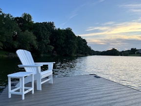 a white bench on a peaceful dock
