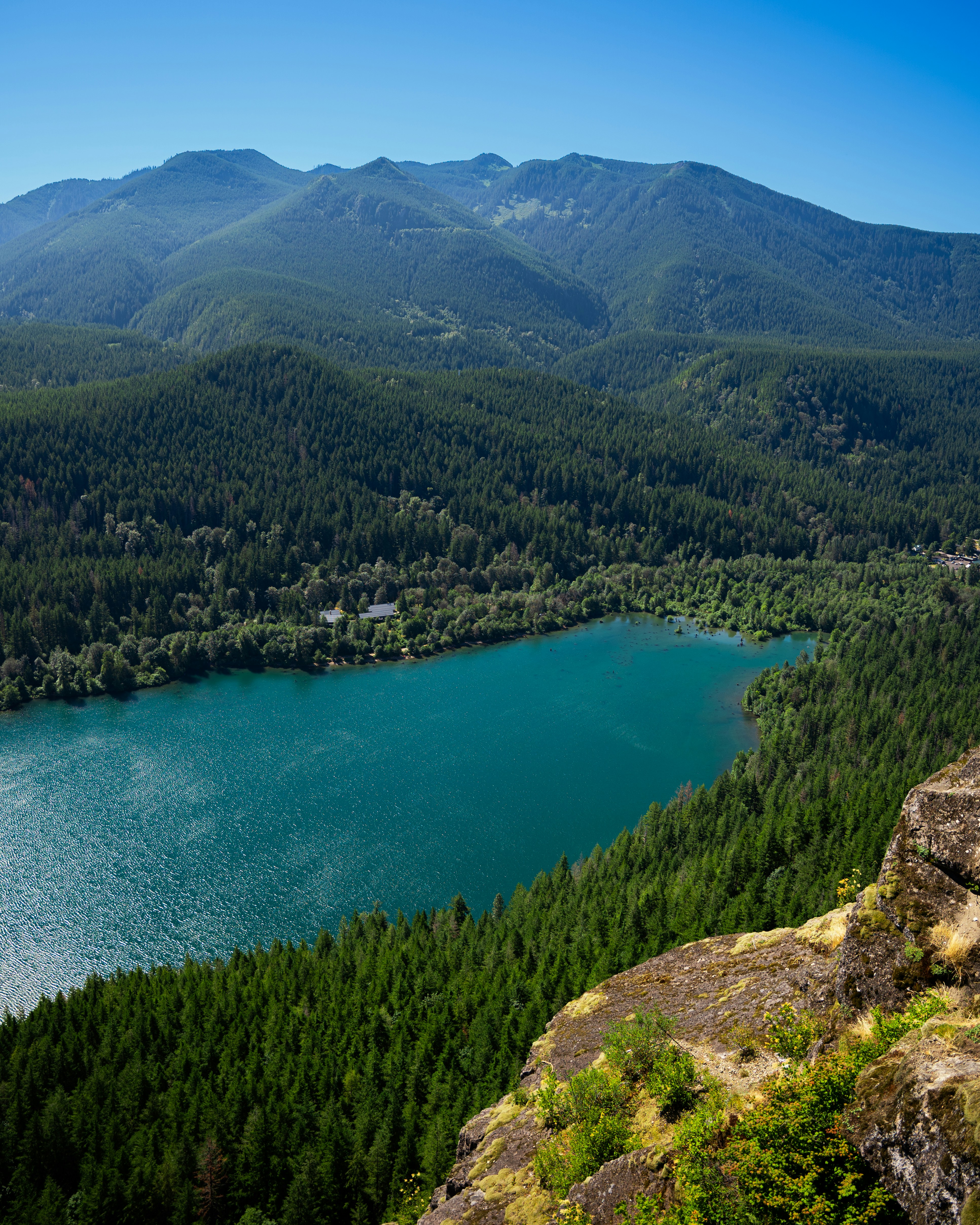 A lake surrounded by trees and mountains photo Free Rattlesnake ledge