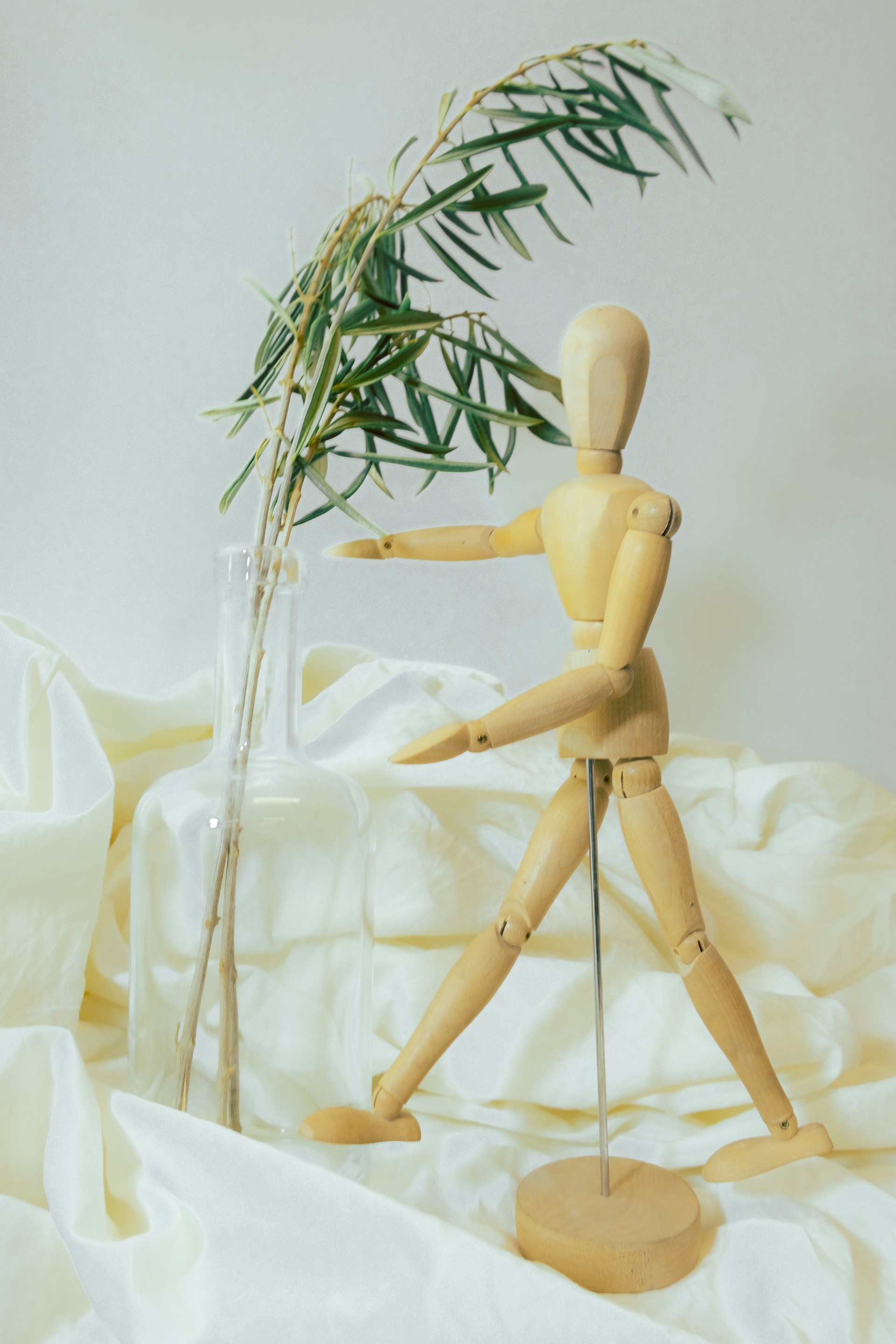 a toy figurine on a white surface