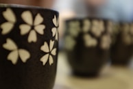 Close-up of an artisanal ceramic cup with intricate patterns.