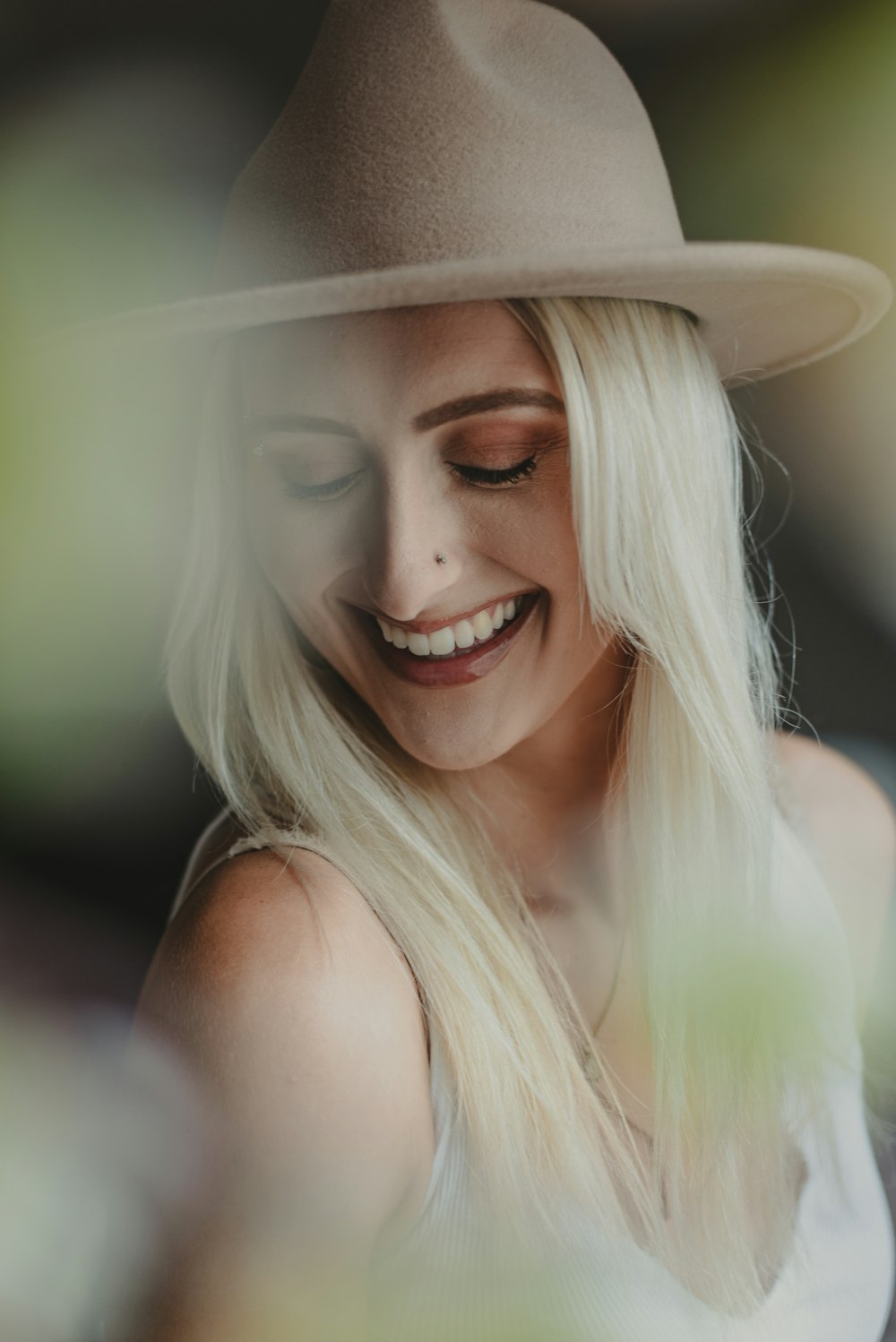 a woman wearing a white hat