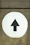 a white circle with a black arrow