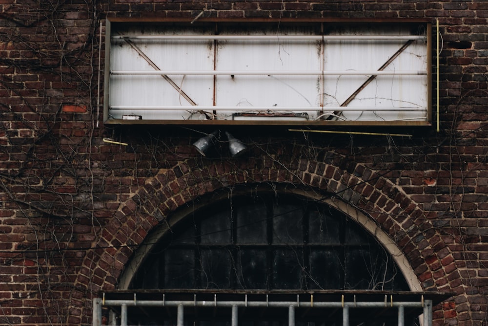 a sign on a brick building