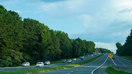 a highway with cars on it