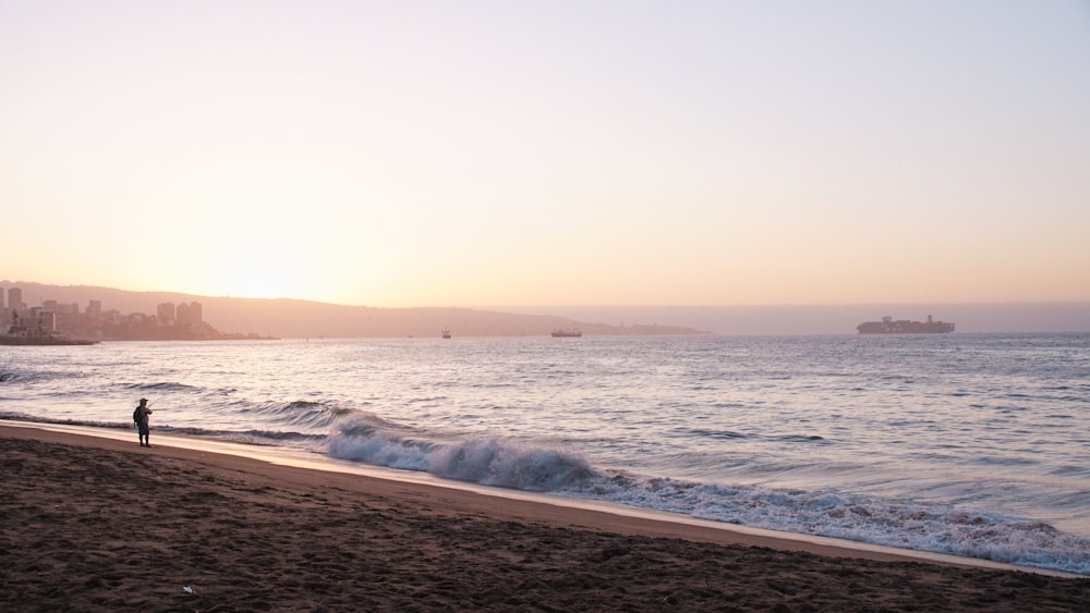 a person standing on a beach