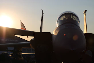 Jet aircraft refueling at dusk, highlighting jet A1 fuel logistics.
