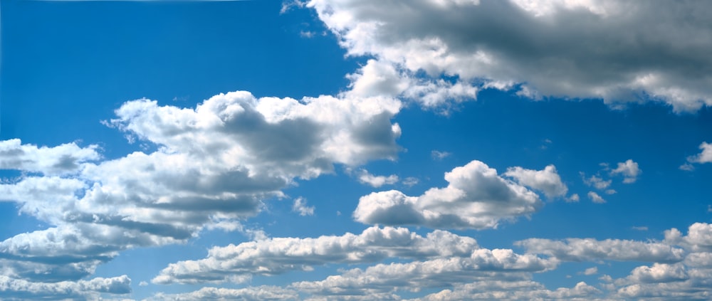 a blue sky with white clouds