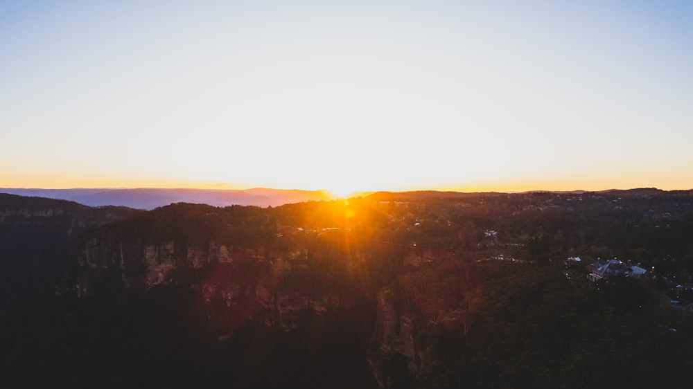 a sunset over a city