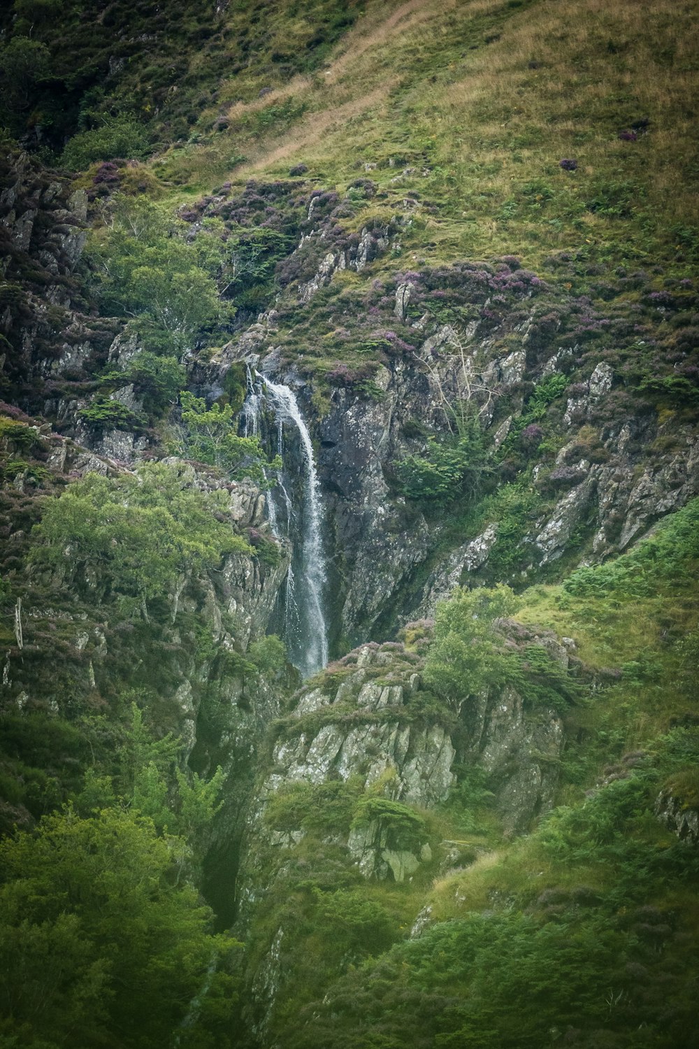 a waterfall in a rocky area