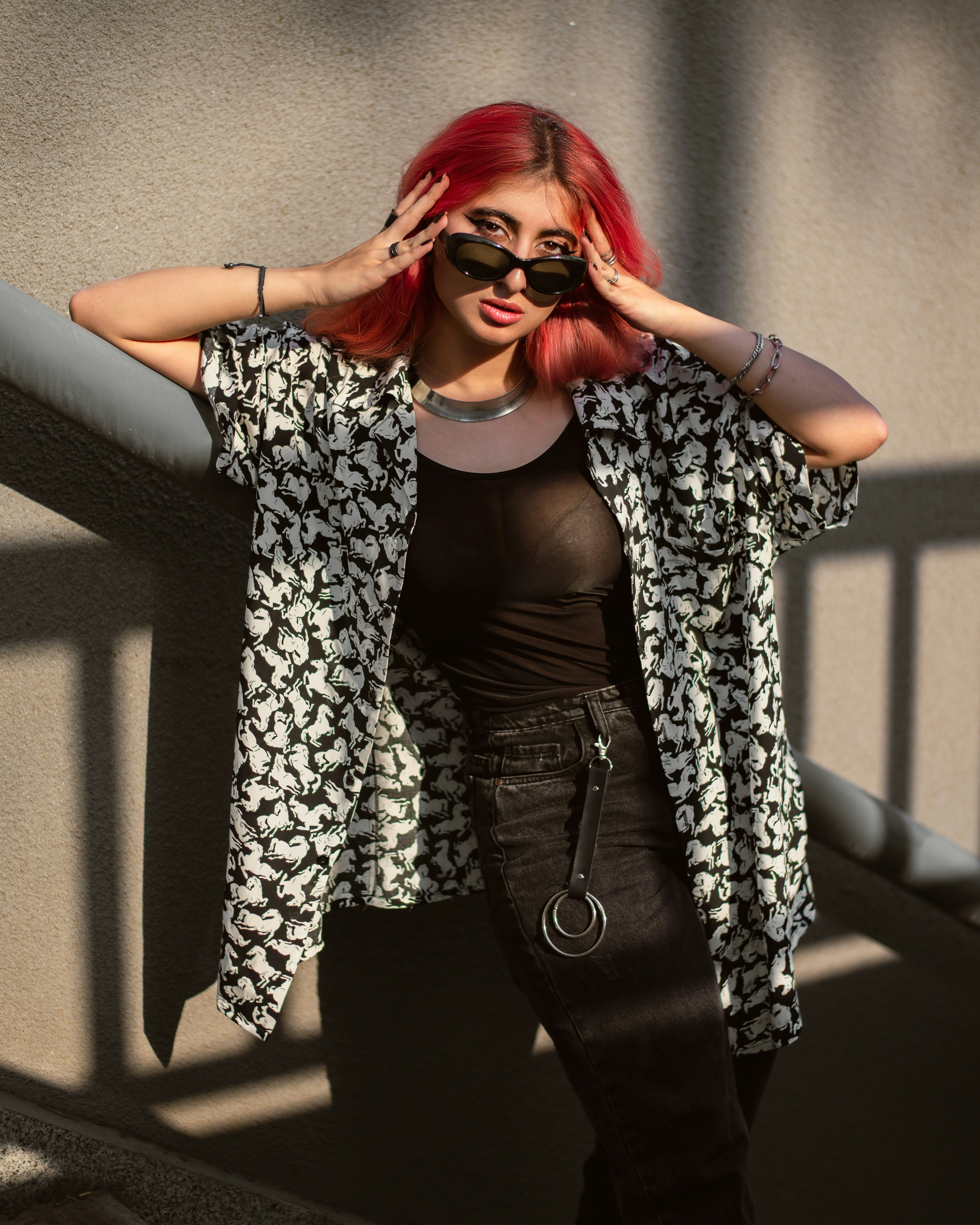 A bold fashion statement: a vibrant outfit against a stark background