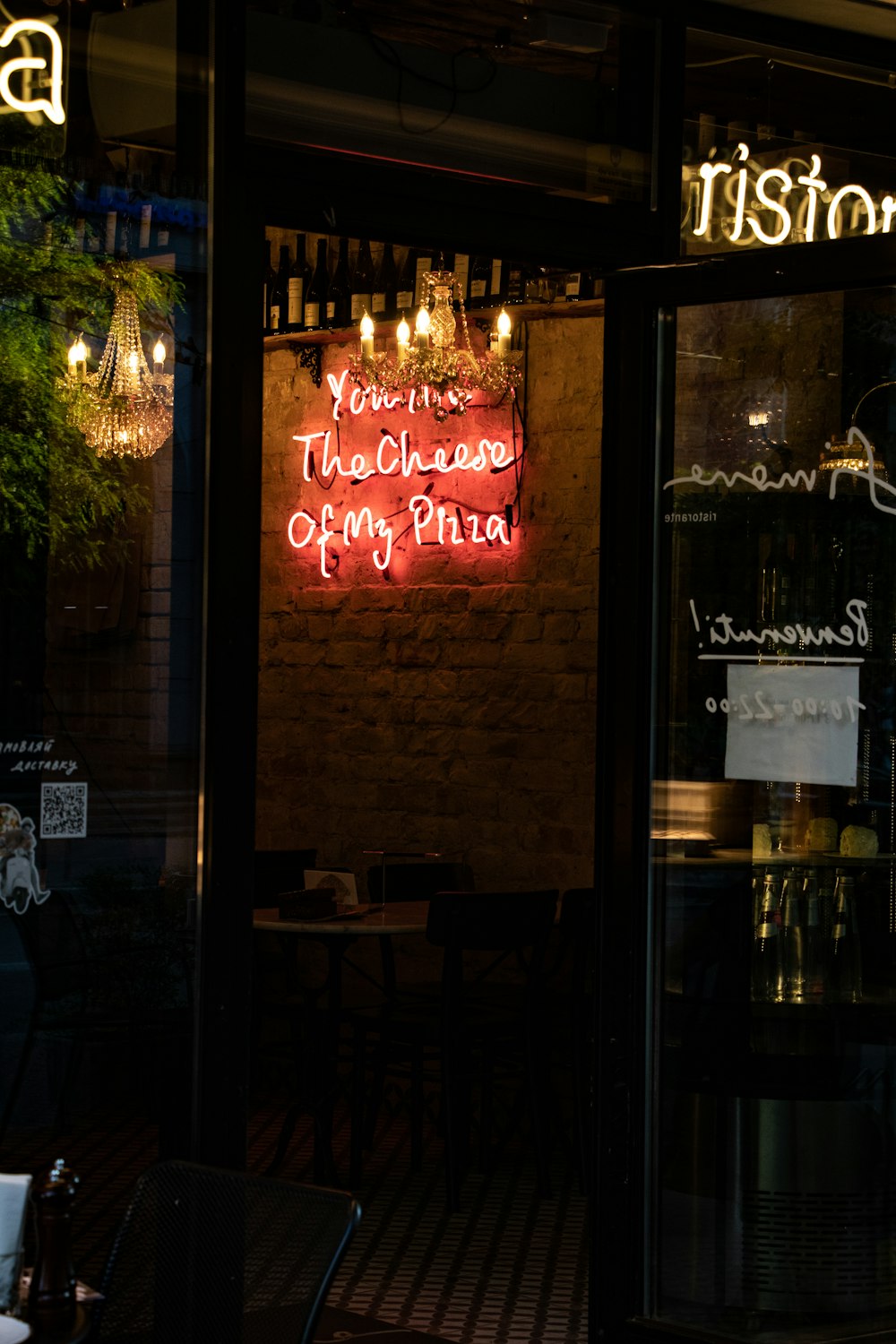 a restaurant with a sign on the door