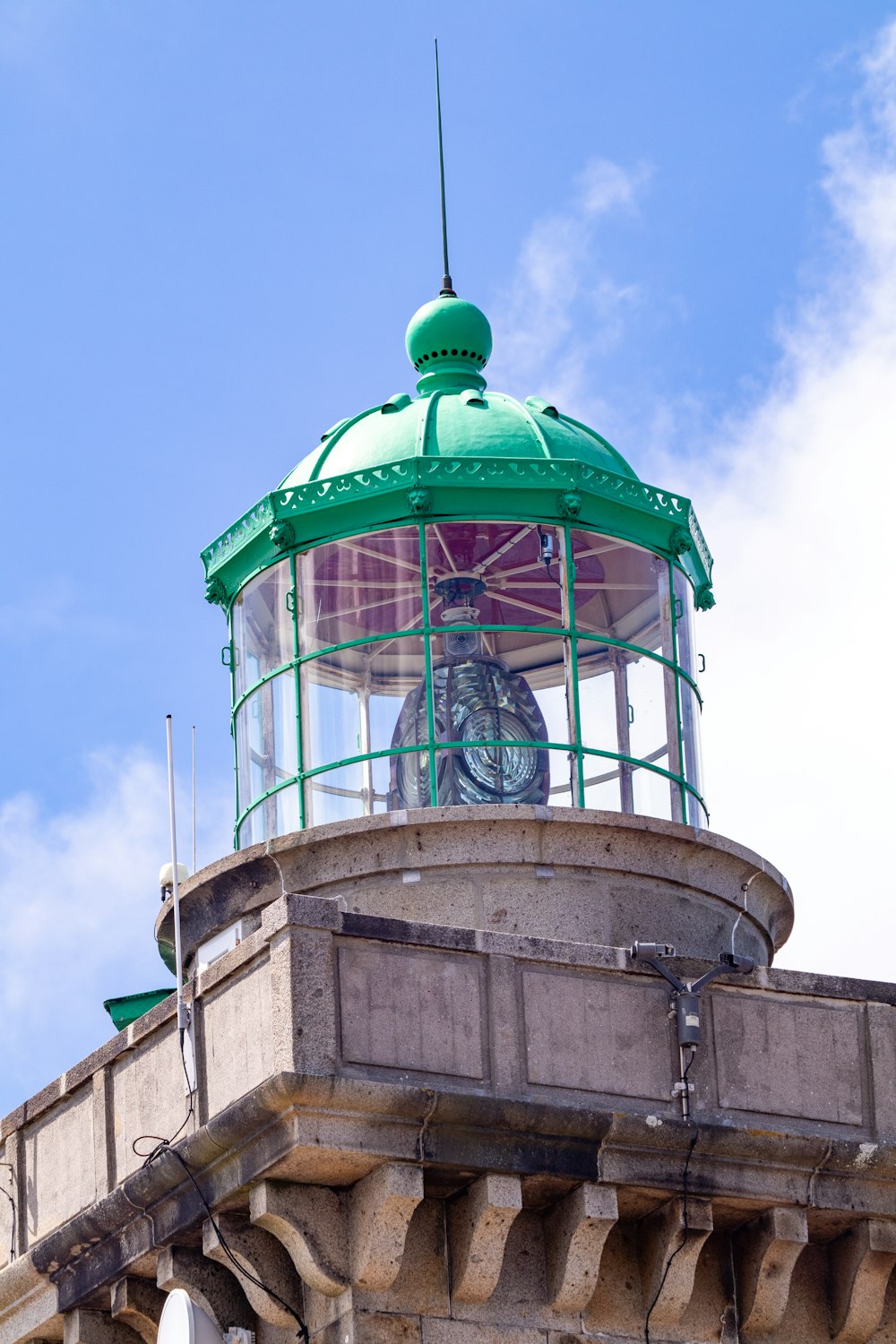 a large green dome on top of a building