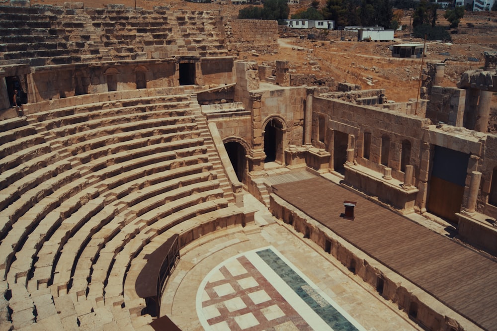 an ancient coliseum with many people