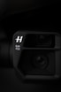 a black camera with a lens