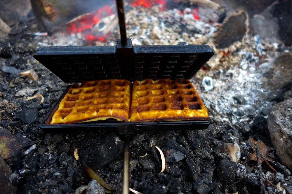 a barbecue grill on the ground